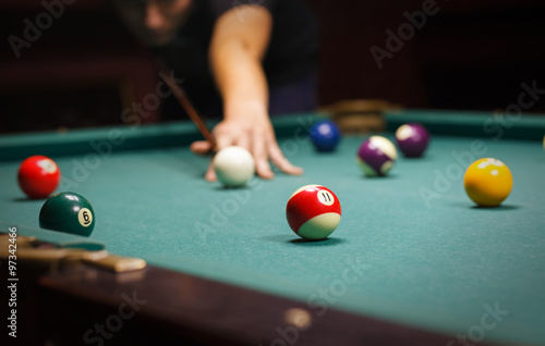 man playing billiard