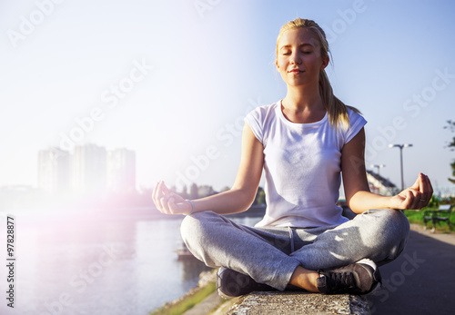 Young girl in yoga pose 
