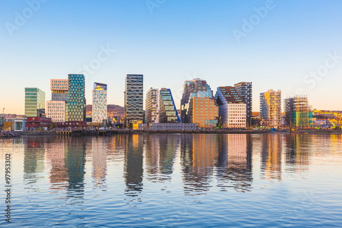 Modern buildings in Oslo with their reflection into the water