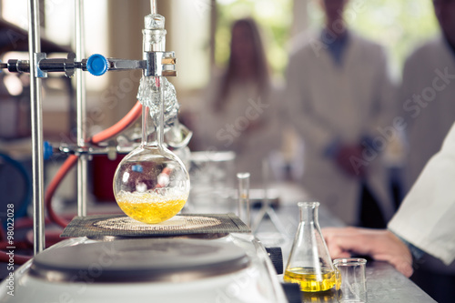 Laboratory equipment for distillation.Separating the component substances from liquid mixture with evaporation and condensation. Industrial chemistry. . Erlemeyer flask, apparatus