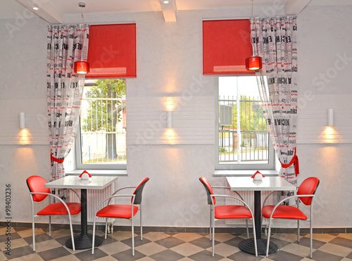 Interior of cafe with red chairs