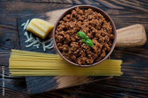 Top view of ingredients for making spaghetti bolognese, close-up