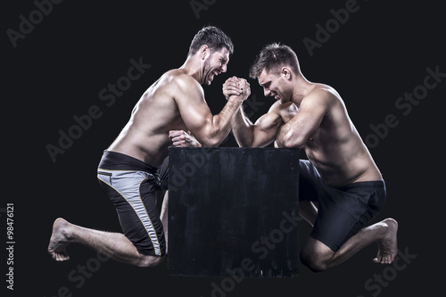 Two sportsmen armwrestling