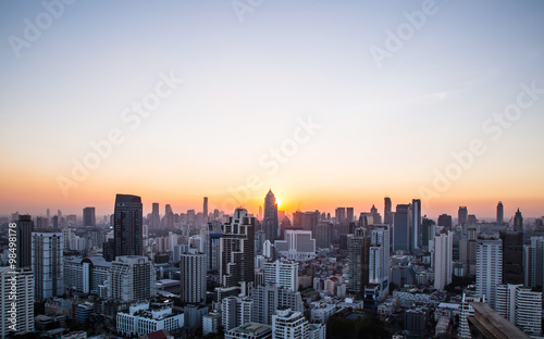 this is Cityscape and sunset at evening time