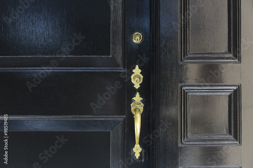 front door, close up of black front door with brass handle