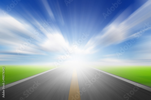 Sun,blue sky and road with motion blur,speed to future concept