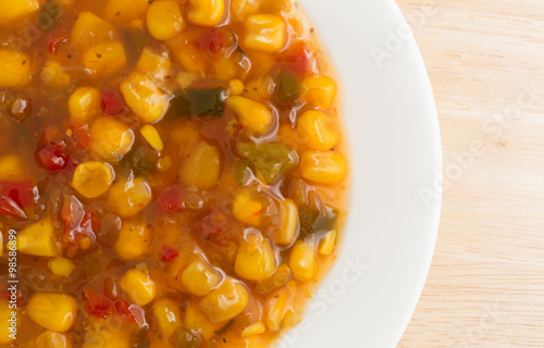 Corn relish in a white dish top view