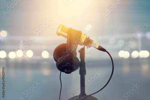 Close up microphone and headphone for announcer in boxing stadium