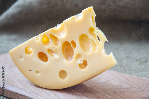 cheese on wooden cutting board