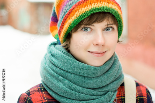 Portrait of beautiful smiling woman in colorful hippy hat