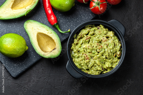 Bowl of guacamole with fresh ingredients