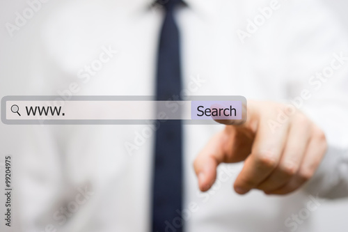businessman is using internet search bar to find the solutions