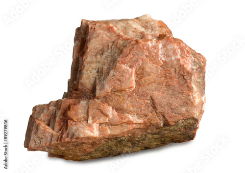 Mineral feldspar isolated on white. Feldspars crystallize from magma as veins in both intrusive and extrusive igneous rocks and are also present in many types of metamorphic rock. 