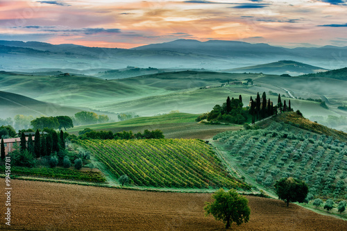 A moody October dawn in San Quirico d'Orcia, Tuscany, Italy