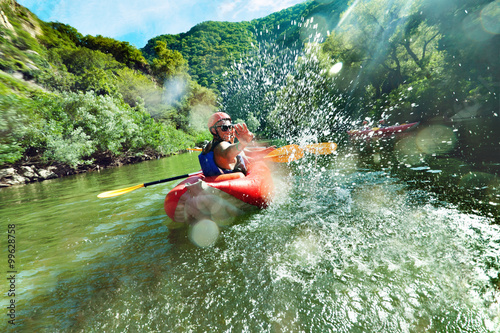 in river canoe splashes