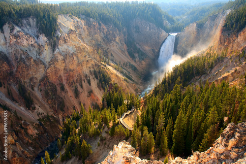 Lower Falls - Sunlight illuminates the spray as the Yellowstone River crashes over the Lower Falls in Yellowstone's Grand Canyon.