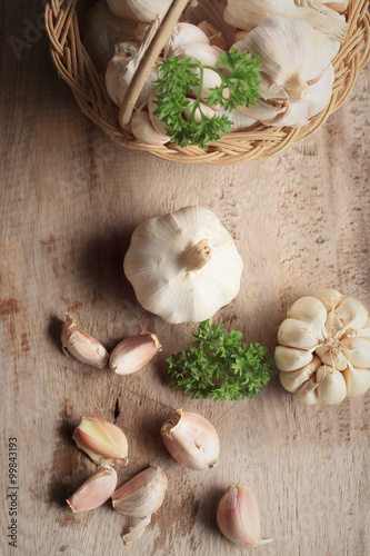 heap garlic on wood background