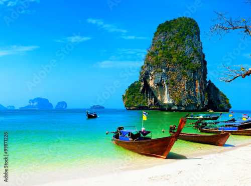 Thailand ocean beach. Thai journey scenery landscape with wooden boats
