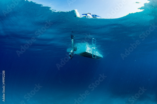 boat ship from underwater blue ocean