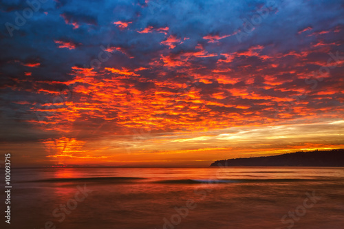 Sea sunrise with dramatic clouds