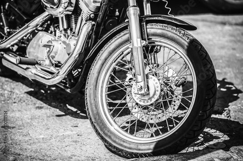 Motorcycle Front wheel close up. Black and white colors