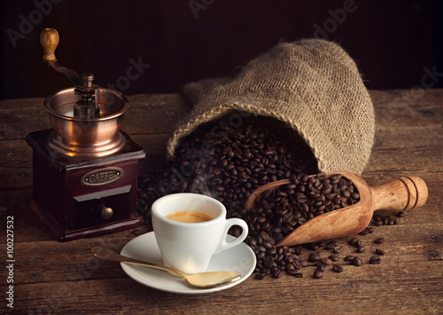 Espresso coffee with old coffee grinder