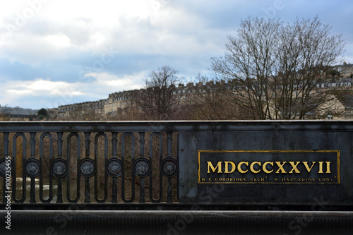 Roman numerals on bridge in Bath, UK. Bridge built in 1827 between Cleveland Place and Bathwick Street in Bath, UK. 