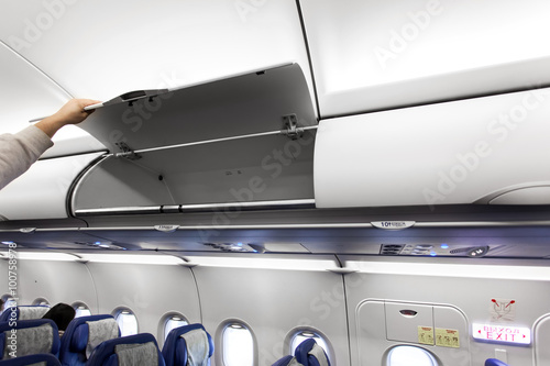 Airplane interior with luggage compartments