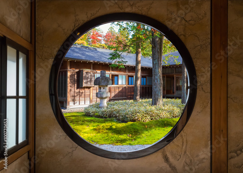 View of a Japanese Garden Through a Round Window