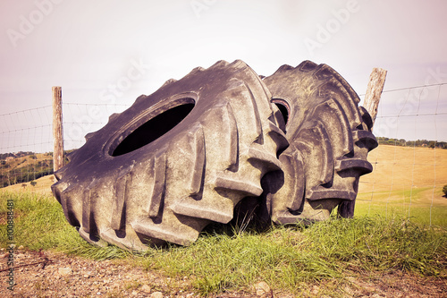 Pair of tires of a big tractor dismantled and left in a Italian