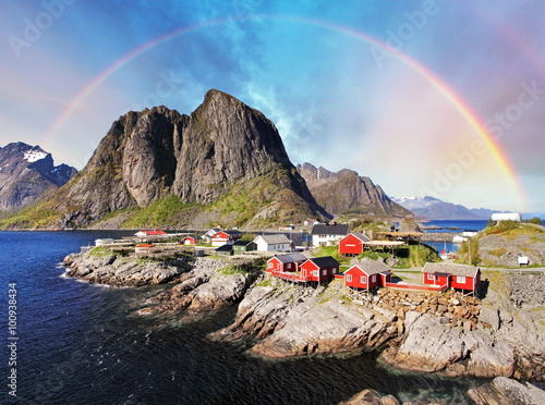 Norwegian fishing village huts with rainbow, Reine, Lofoten Isla