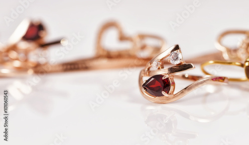 gold ring is gracefully curved shape ruby