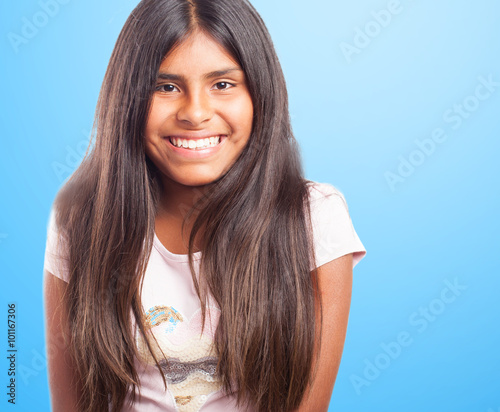 pretty young girl smiling with a positive gesture