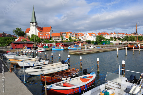 Marina and white church in Ronne, Bornholm, Denmark