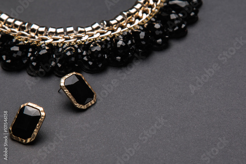Necklace and earrings with black stones