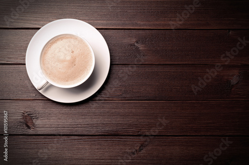 coffee cream cappuccino cup on wooden background morning breakfast