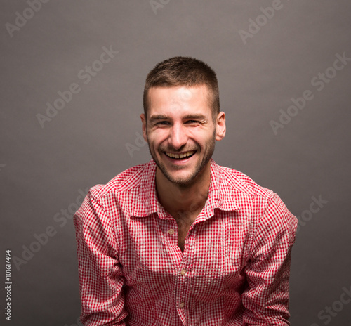 Smiling model man in studio
