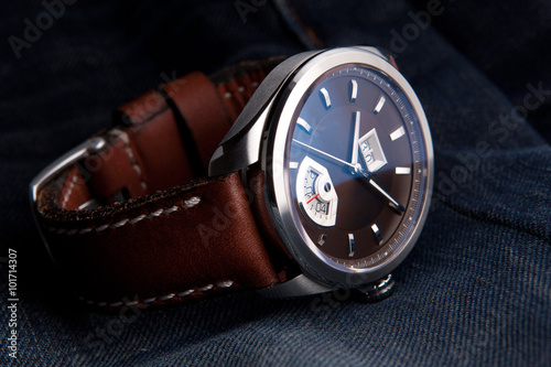 Wrist watch with brown dial on brown leather strap