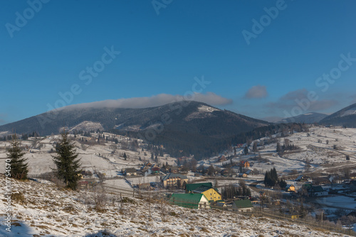 Village in mountains Carpathians in winter. Ukraine. 