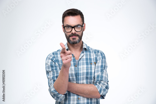 Man in glasses showing gun gesture with fingers
