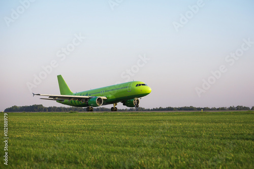green plane taking off
