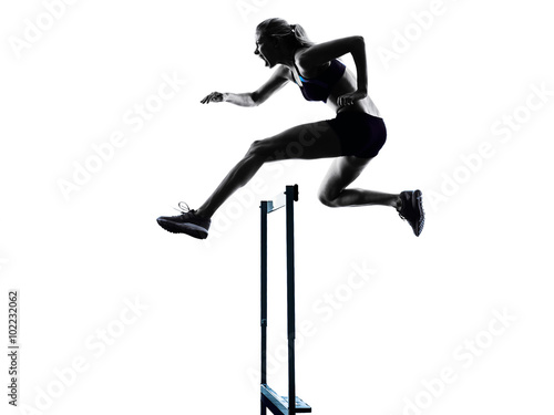 woman hurdlers hurdling silhouette