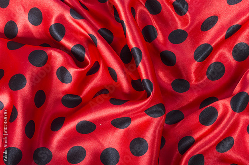 black and red polka dot satin fabric background