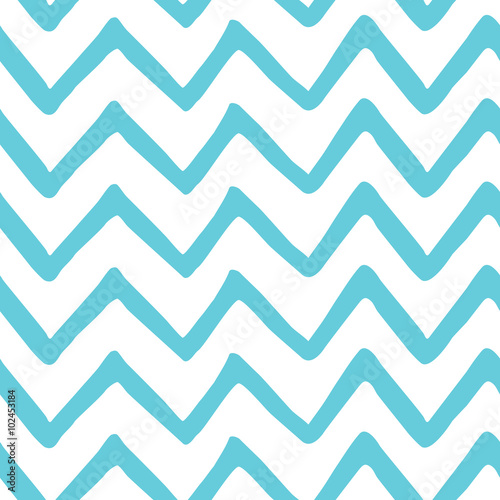 Abstract light blue zig zag seamless hand painted pattern. Nature sea fabric texture. Vector template chevron background for summer holiday design or card.