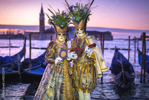 Costumed couple on the San Marco square during Carnival in Venic