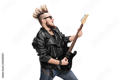 Punk rock guitarist playing electric guitar