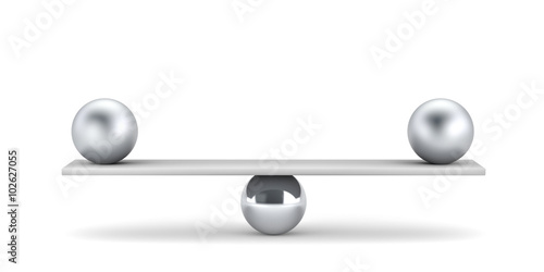 Metal balls on plank