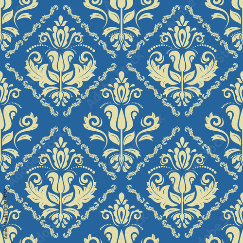 Seamless oriental ornament in the style of baroque. Traditional classic vector pattern. Blue and yellow wallpaper