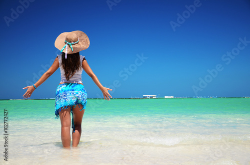 Young woman relaxing on tropical carribean beach