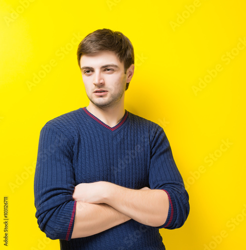 young man on a yellow background